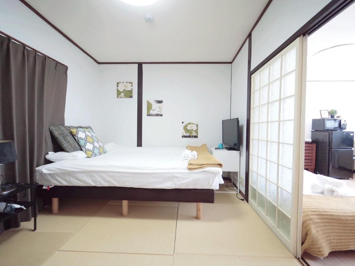 Nippori Osaka Nishi-Tengachaya Guesthouse西天下茶屋アパートメント Bagian luar foto