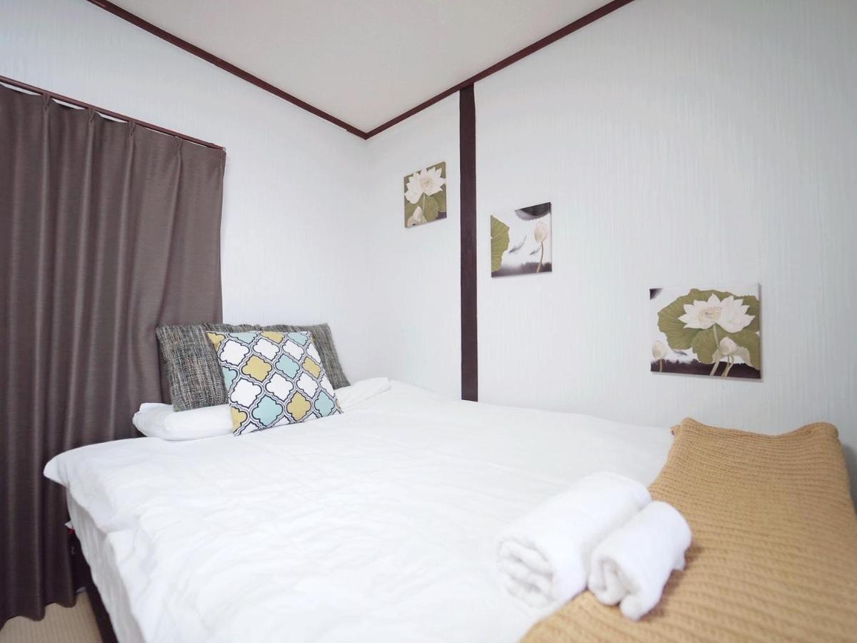 Nippori Osaka Nishi-Tengachaya Guesthouse西天下茶屋アパートメント Bagian luar foto