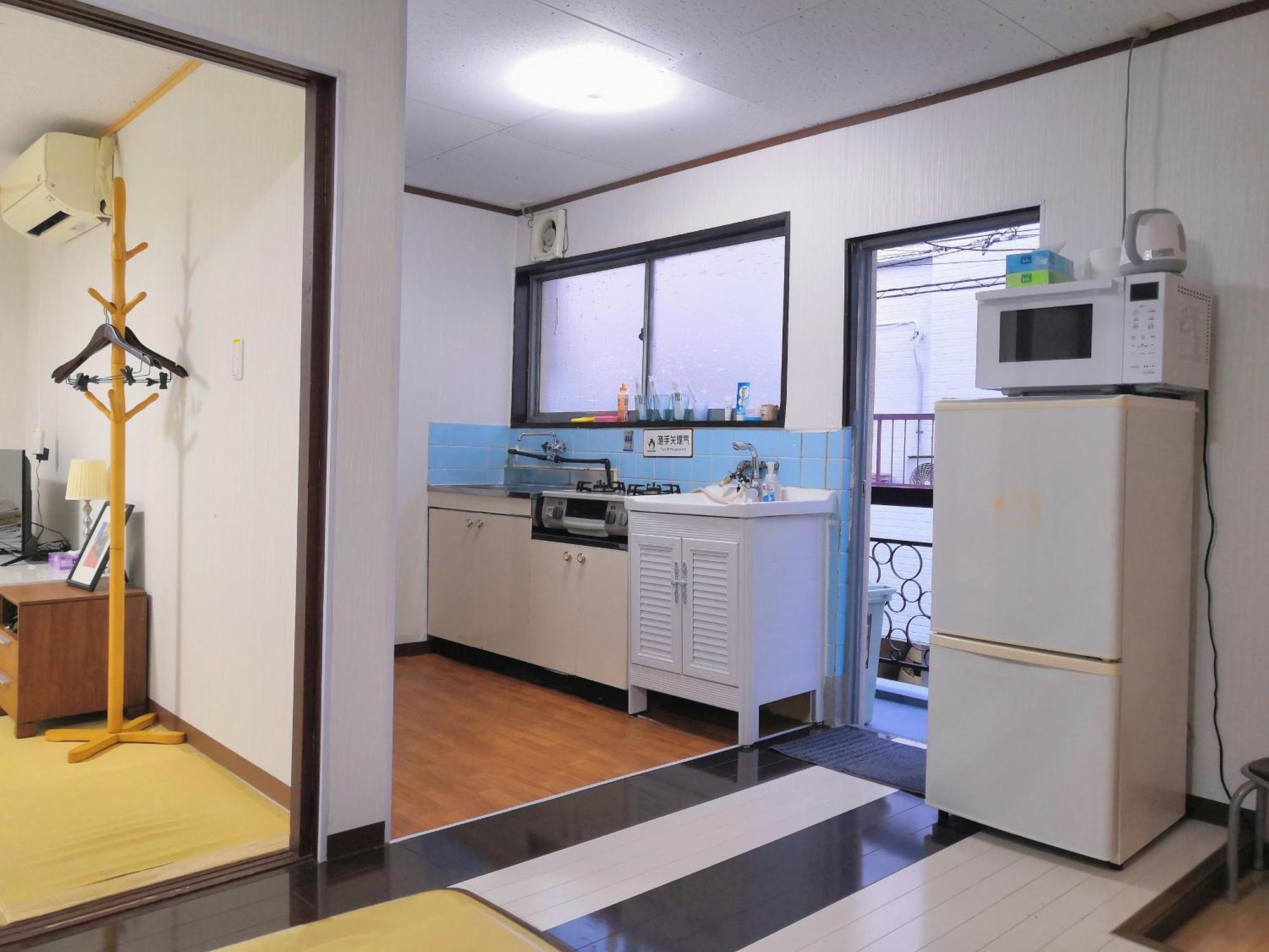 Nippori Osaka Nishi-Tengachaya Guesthouse西天下茶屋アパートメント Bagian luar foto