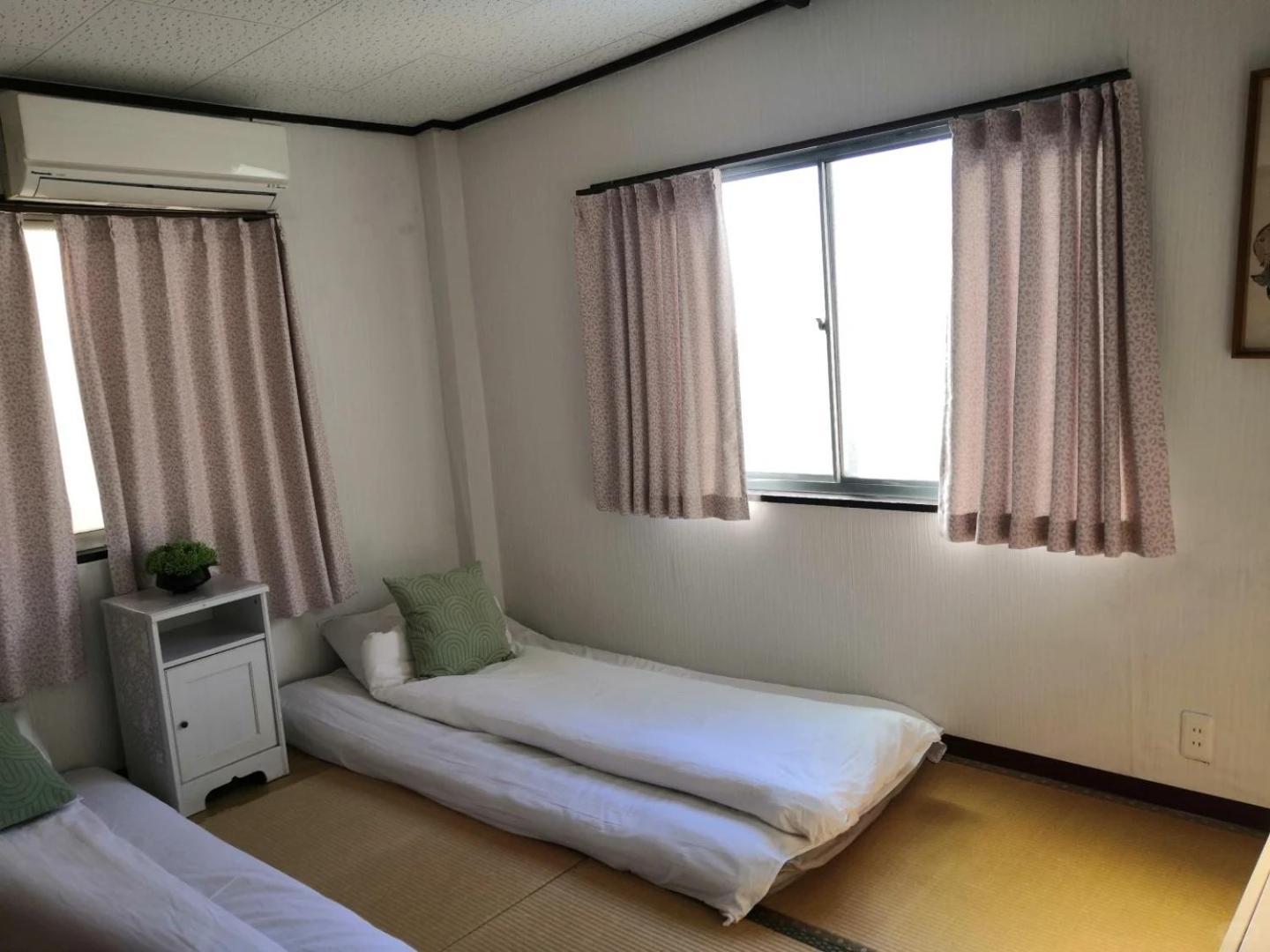 Nippori Osaka Nishi-Tengachaya Guesthouse西天下茶屋アパートメント Bagian luar foto