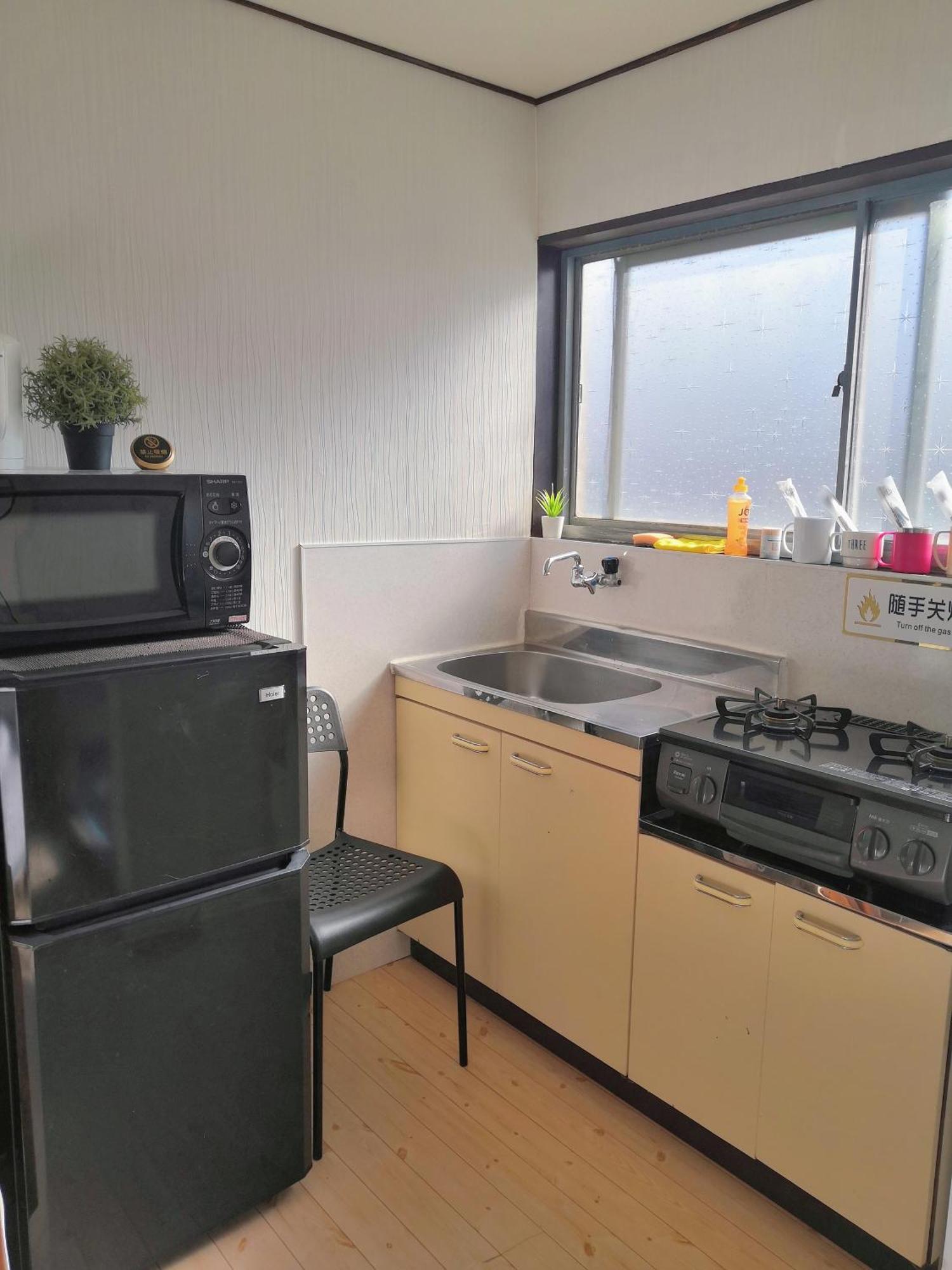 Nippori Osaka Nishi-Tengachaya Guesthouse西天下茶屋アパートメント Bagian luar foto
