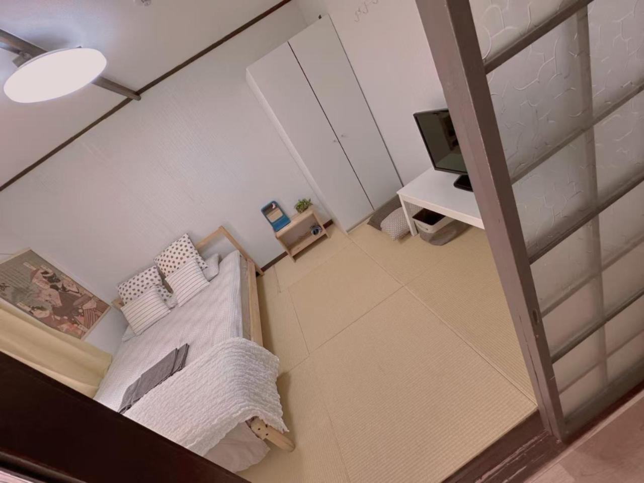 Nippori Osaka Nishi-Tengachaya Guesthouse西天下茶屋アパートメント Bagian luar foto