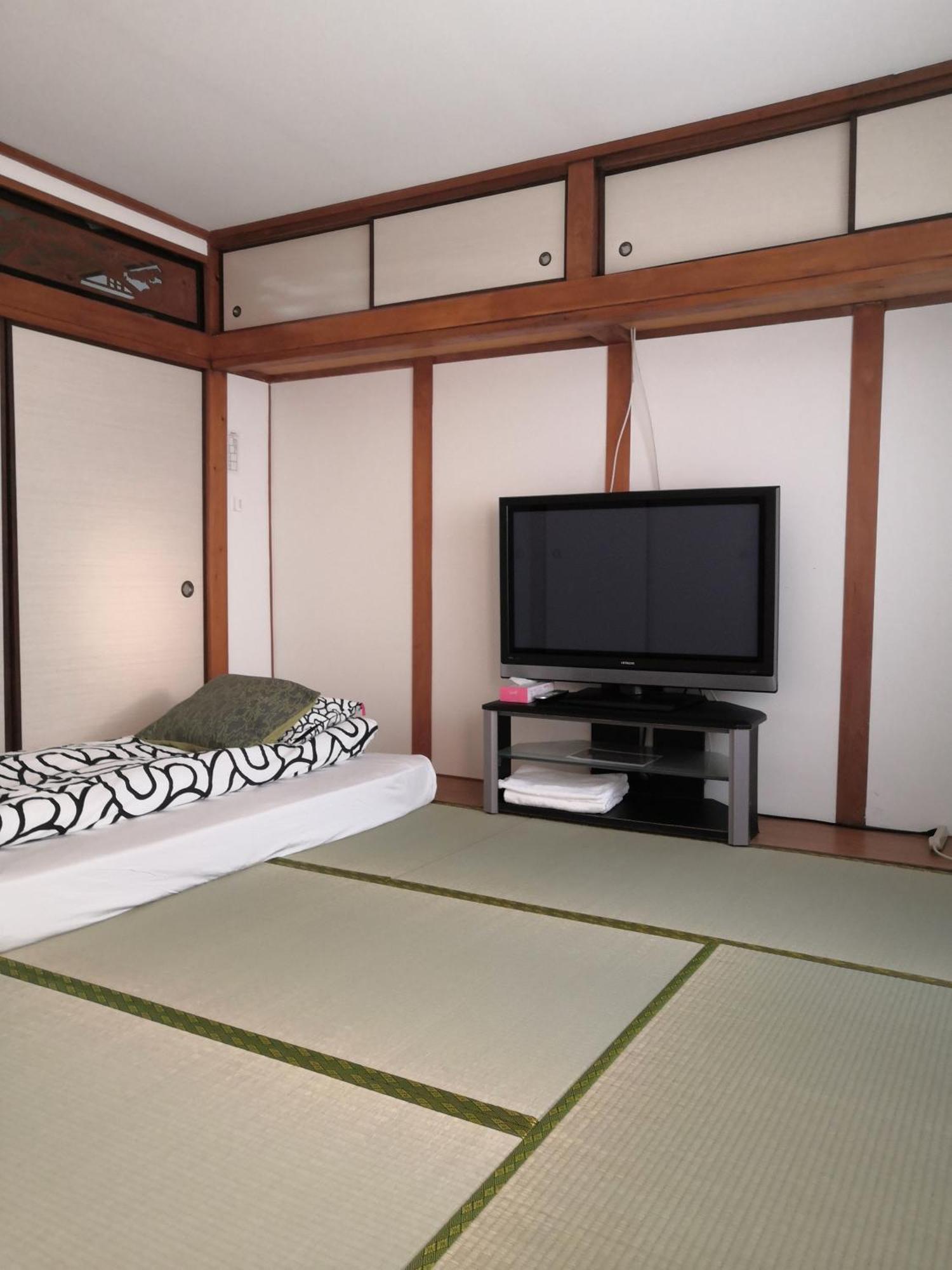 Nippori Osaka Nishi-Tengachaya Guesthouse西天下茶屋アパートメント Bagian luar foto